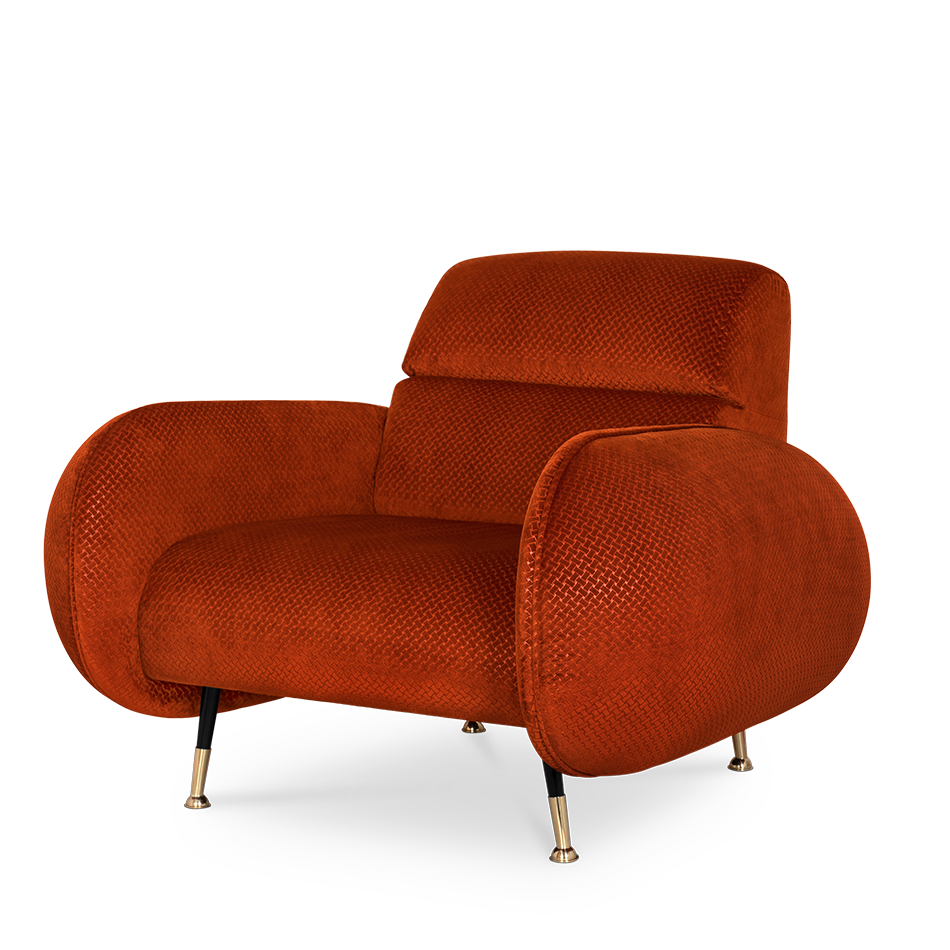 Modern armchair upholstered in terracotta orange fabric with gold metal legs.